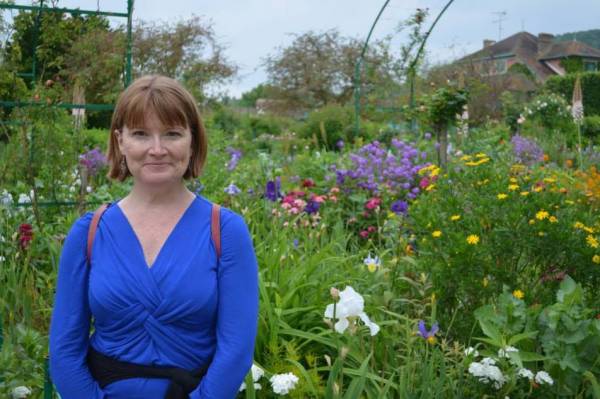 Mary went on a wonderful whirlwind tour of Europe, enjoying time in Budapest, Paris, and more. Seen here relaxing at Monet's garden in Giverny.