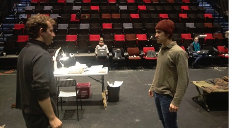 Scott and Mateo rehearse, Anisa supervising, a moment in Holden. Anne, our stage manager, is over on the right with the blue scarf. Matteo’s character (Zev), on the right, is teasing Scott’s (Hinckley) about being a “rhyming prosey man”. They’ll soon be on the floor wrestling.